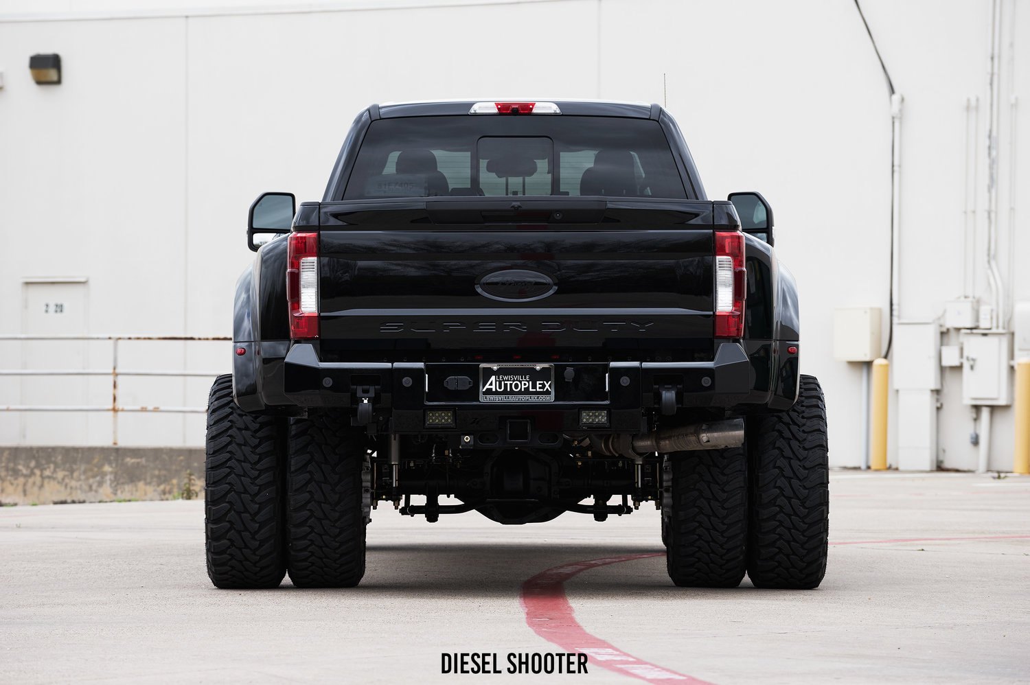 6 Inch Suspension Lift Kit on Custom Black Ford F-450 - Photo by Diesel Shooter