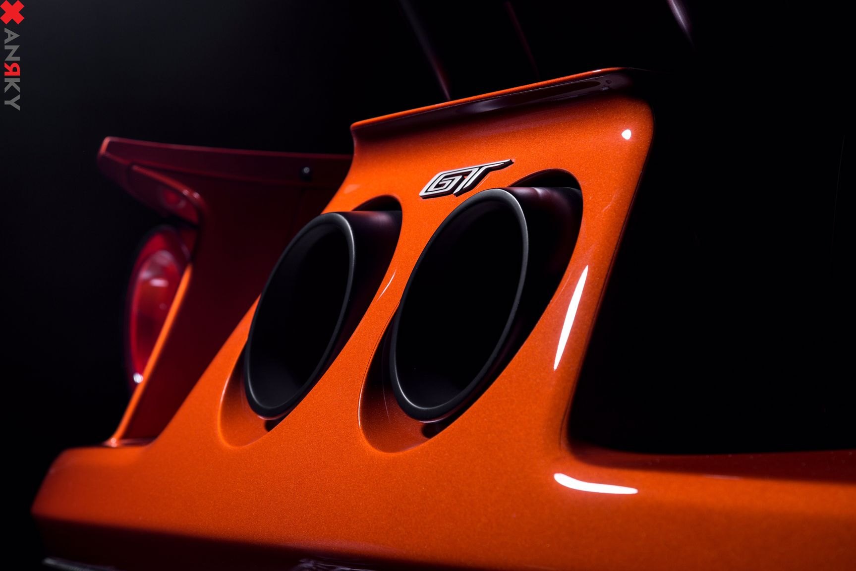Custom Exhaust System on Orange Ford GT - Photo by Anrky Wheels