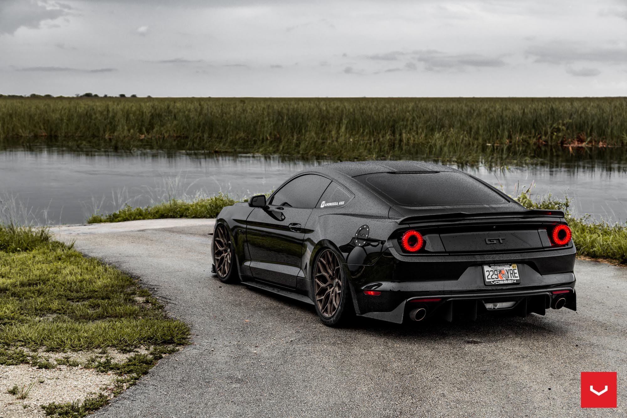 Black Ford Mustang GT with Aftermarket Rear Spoiler - Photo by Vossen