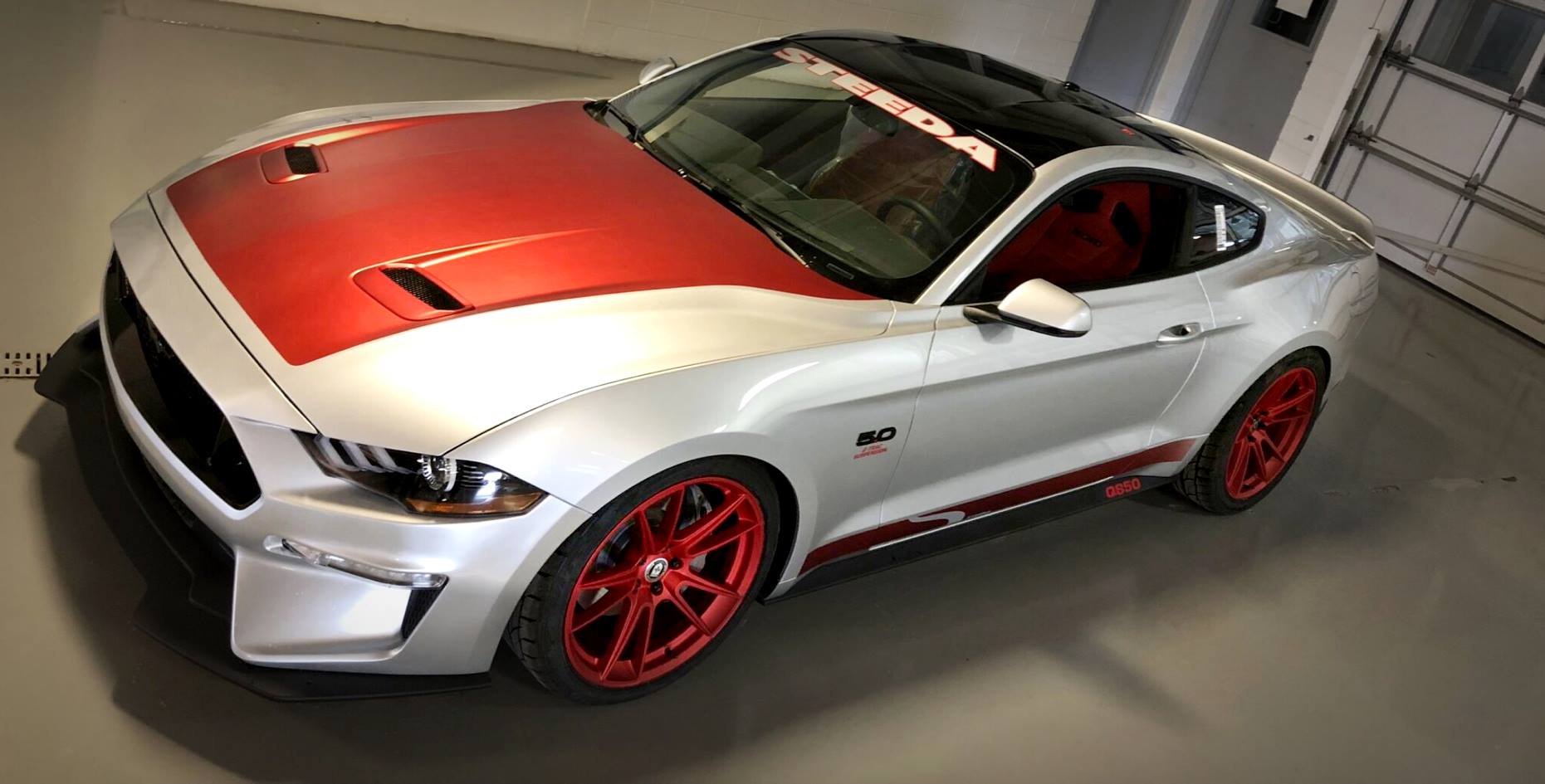 White Ford Mustang with Aftermarket Red Vented Hood - Photo by Steeda Performance