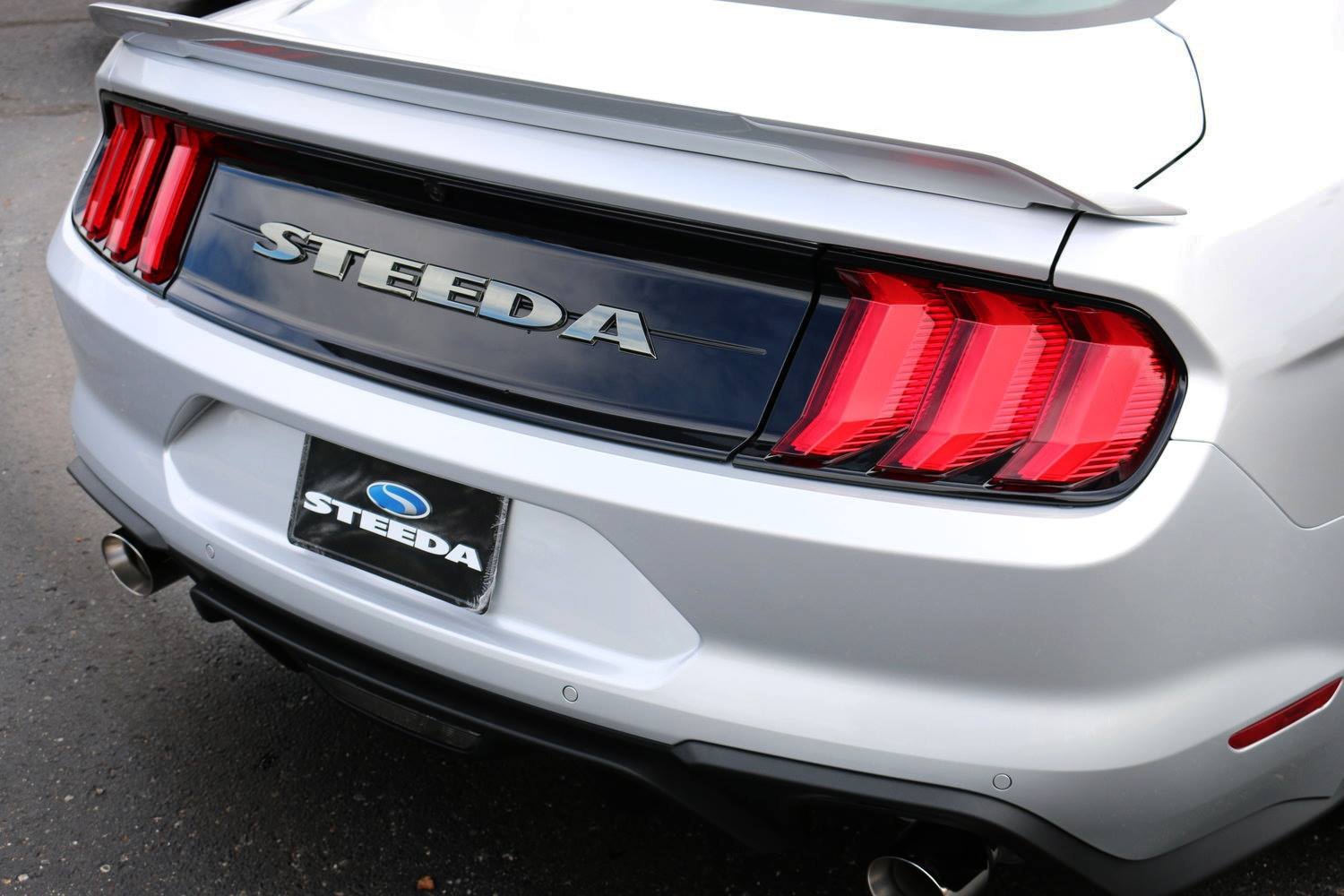 White Ford Mustang 5.0 with Aftermarket Rear Diffuser - Photo by Steeda Performance