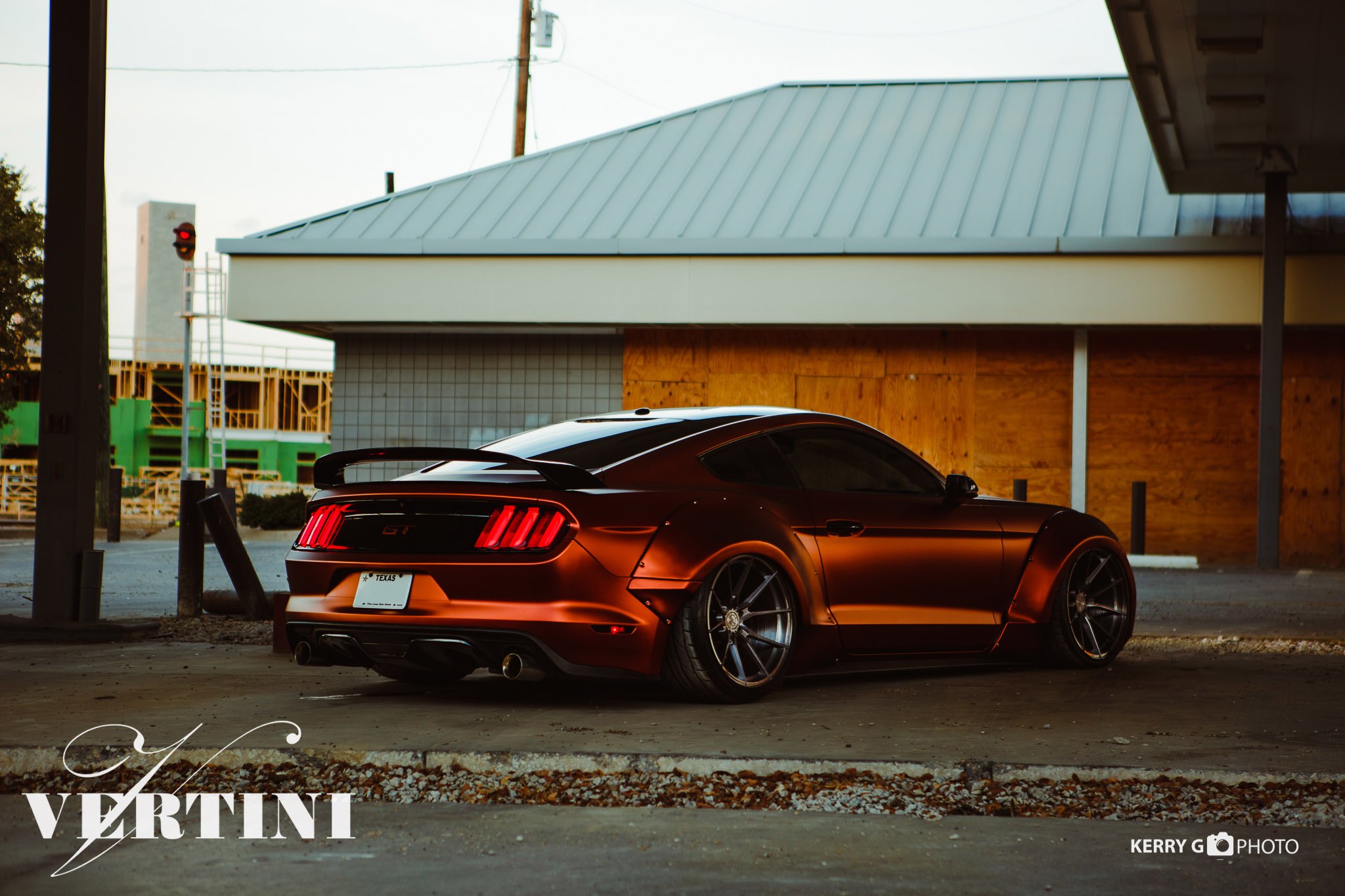 Orange Ford Mustang with Custom Style Rear Spoiler - Photo by Vertini Wheels