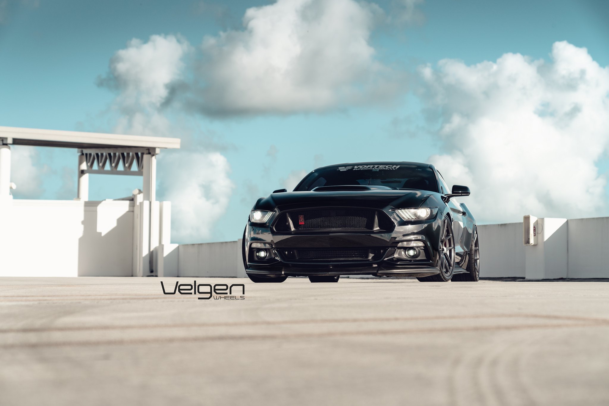 Front Bumper with Fog Lights on Black Ford Mustang - Photo by Velgen Wheels