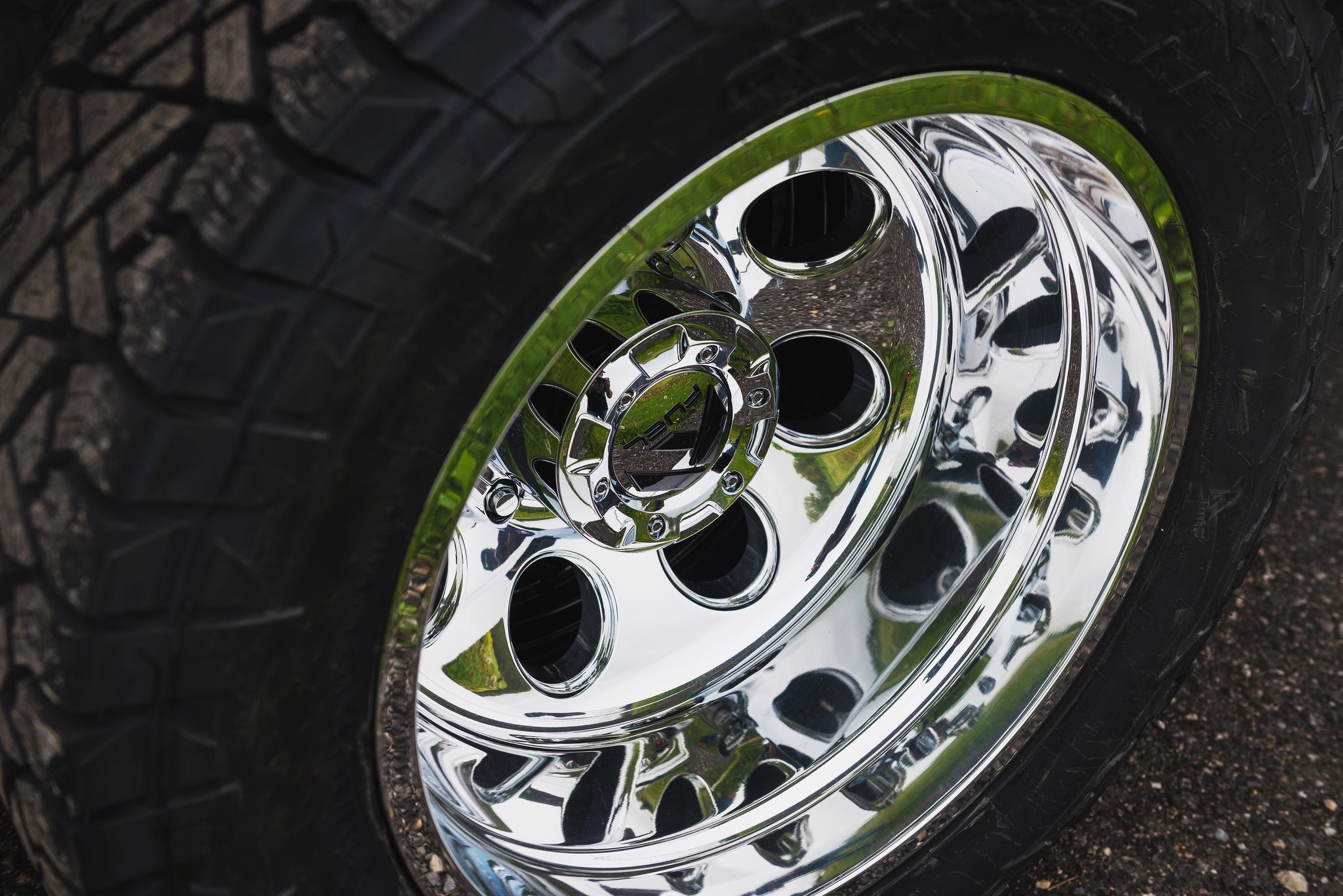 Black GMC Sierra Denali with Chrome Fuel Offroad Wheels - Photo by Fuel Offroad