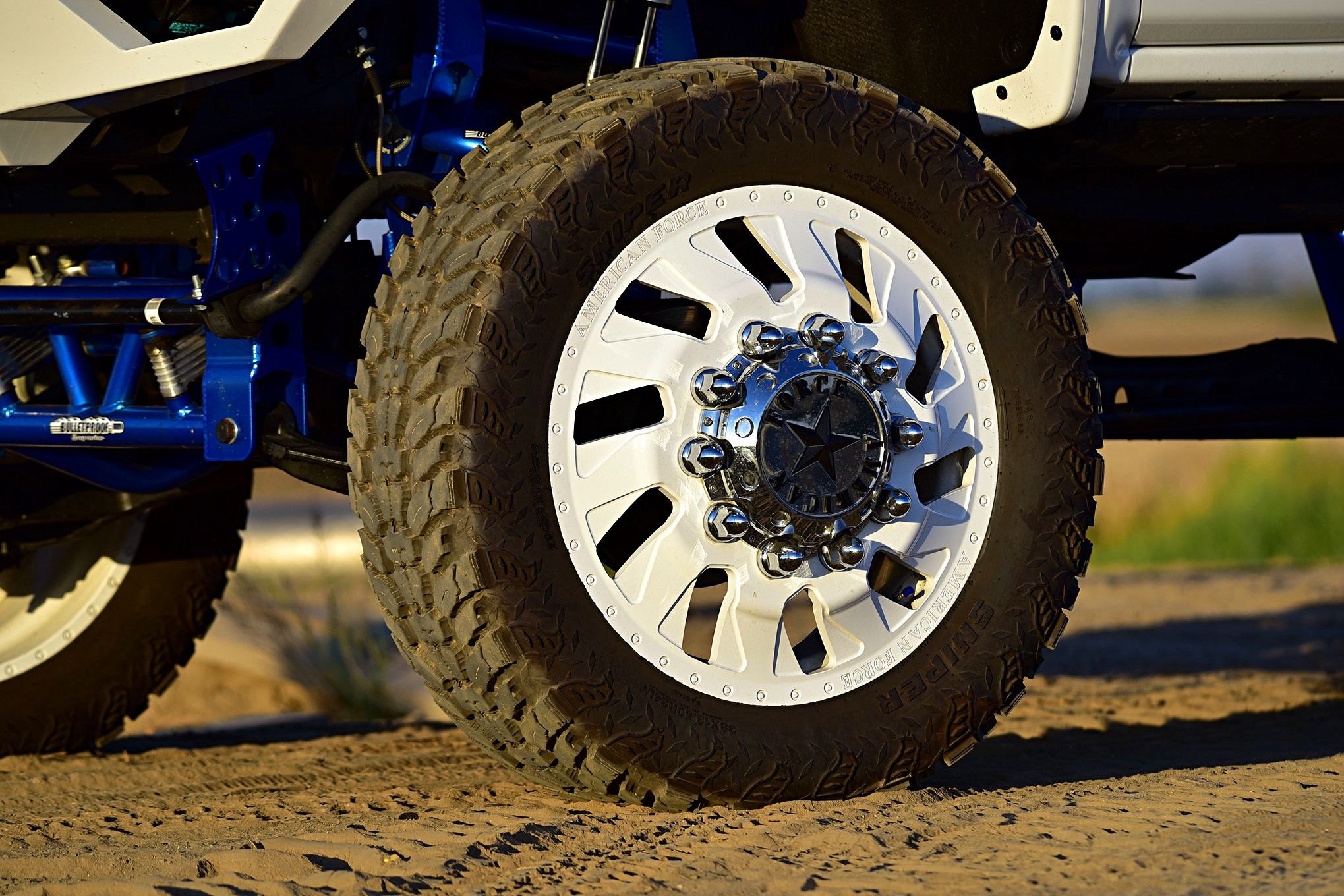 Custom American Force Wheels on White Lifted GMC Sierra Denali - Photo by Eddie Maloney