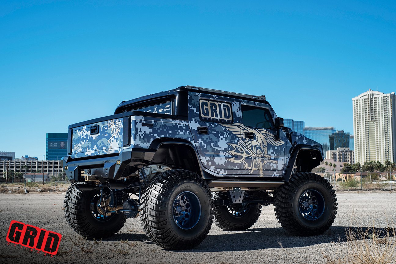 Pocket Style Fender Flares on Lifted Hummer H2 - Photo by Grid Off-Road