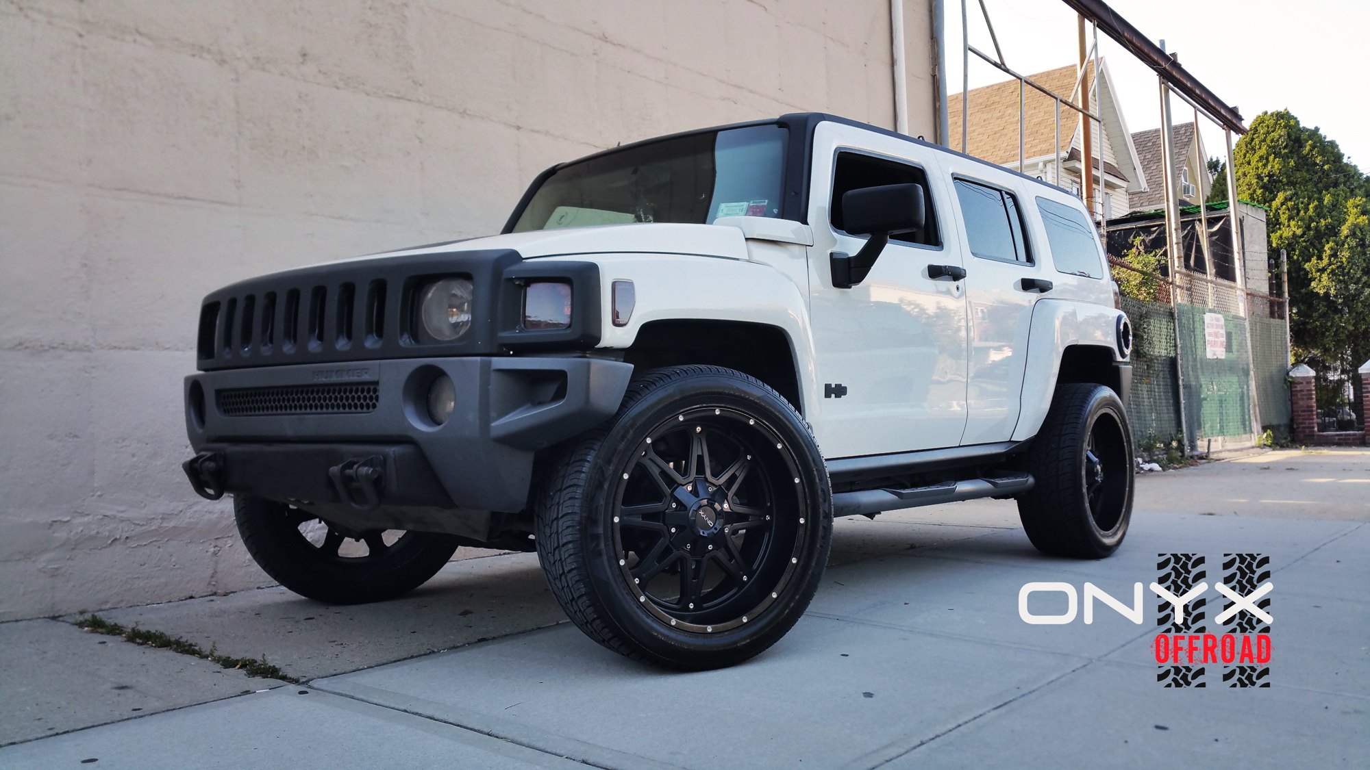 White Hummer H3 with Aftermarket Front Bumper - Photo by Onyx Offroad