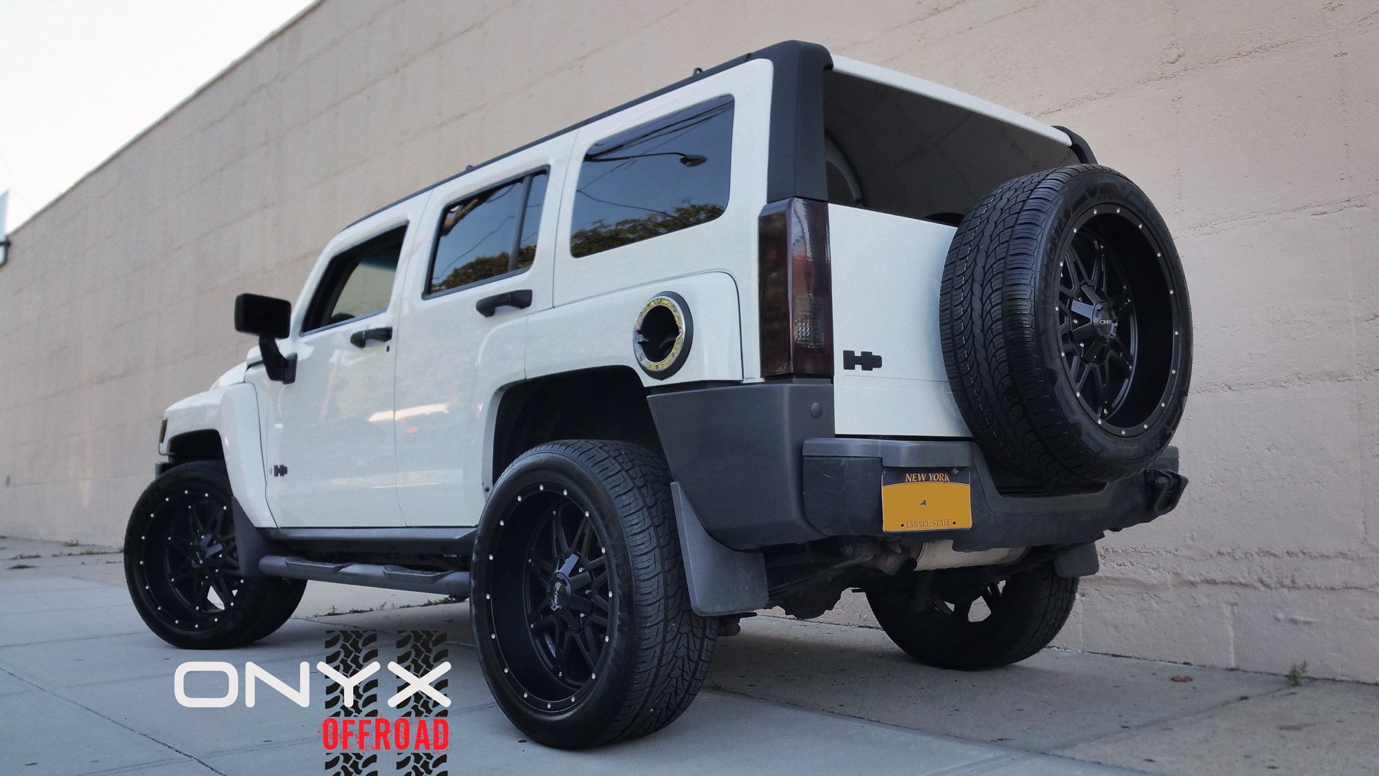 Custom Nerf Steps on White Hummer H3 - Photo by Onyx Offroad