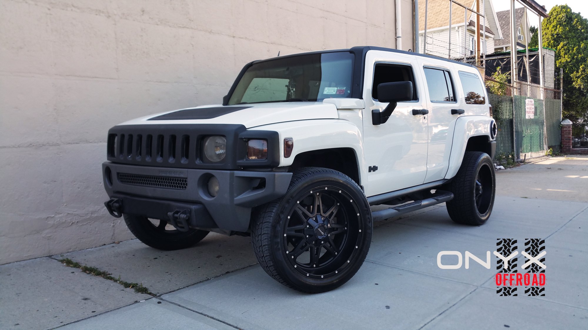 White Hummer H3 with Gloss Black Onyx Wheels - Photo by Onyx Offroad