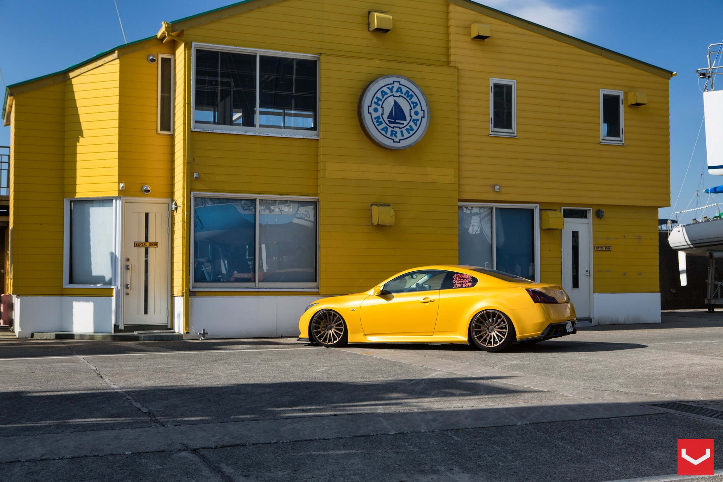 Yellow Debadged Infiniti G37 with Vossen Wheels - Photo by Vossen