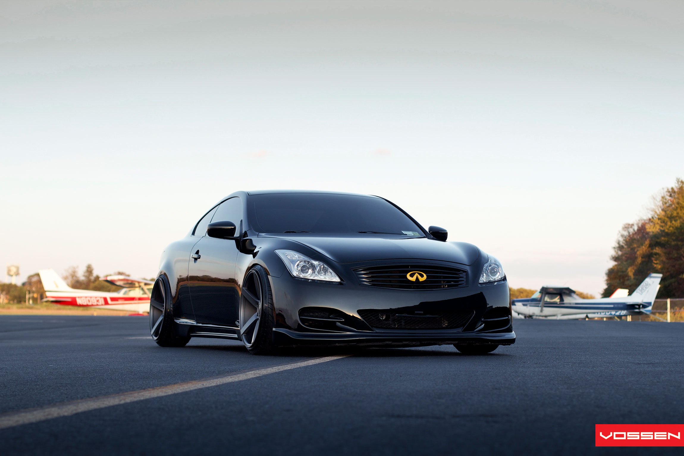 Blacked Out Grille with Custom Emblem on Infiniti G37 - Photo by Vossen