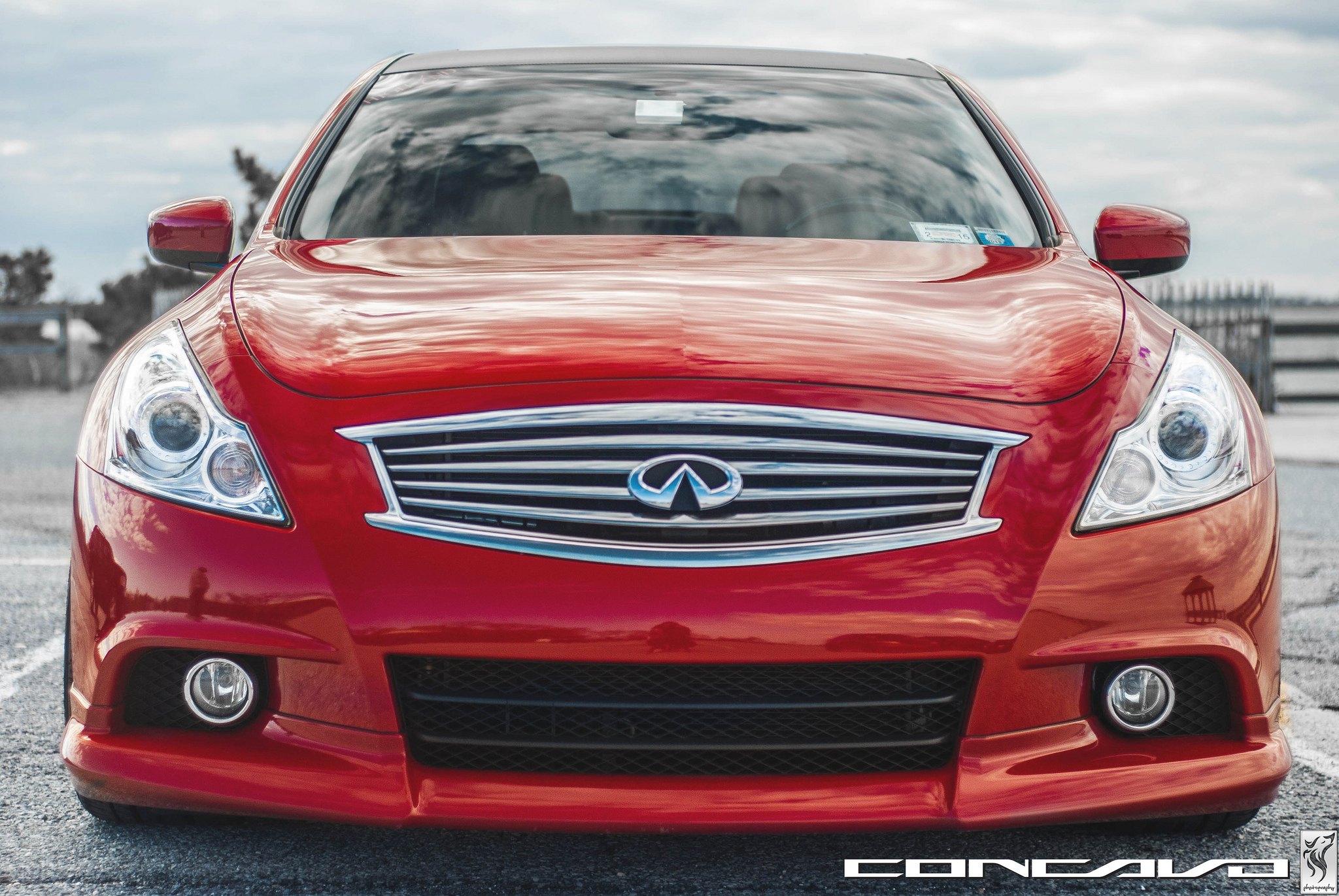Red Infiniti G37 Aftermarket Front Bumper - Photo by Vossen
