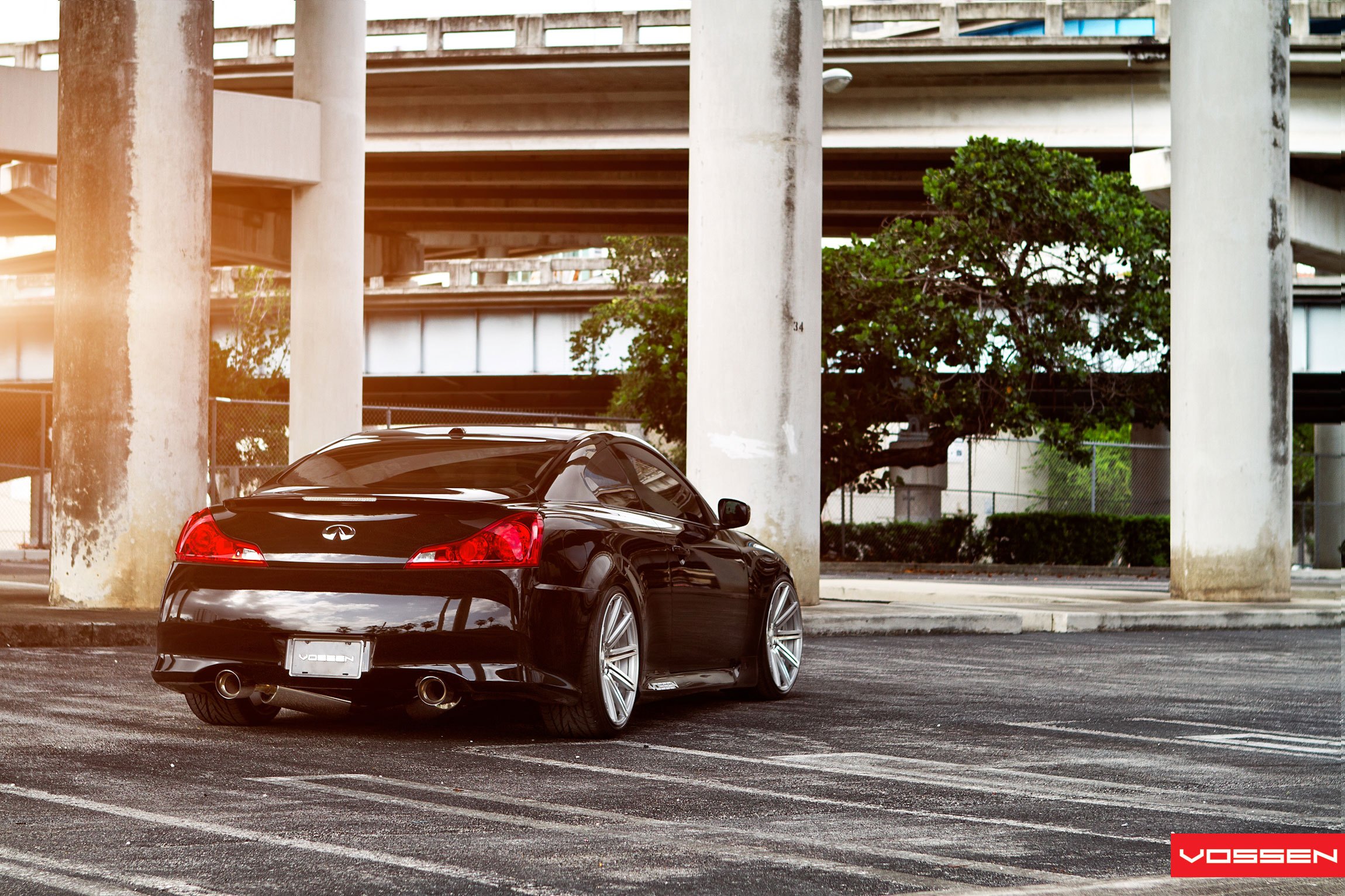 Black Stanced Infiniti G37 with Custom Exhaust System - Photo by Vossen