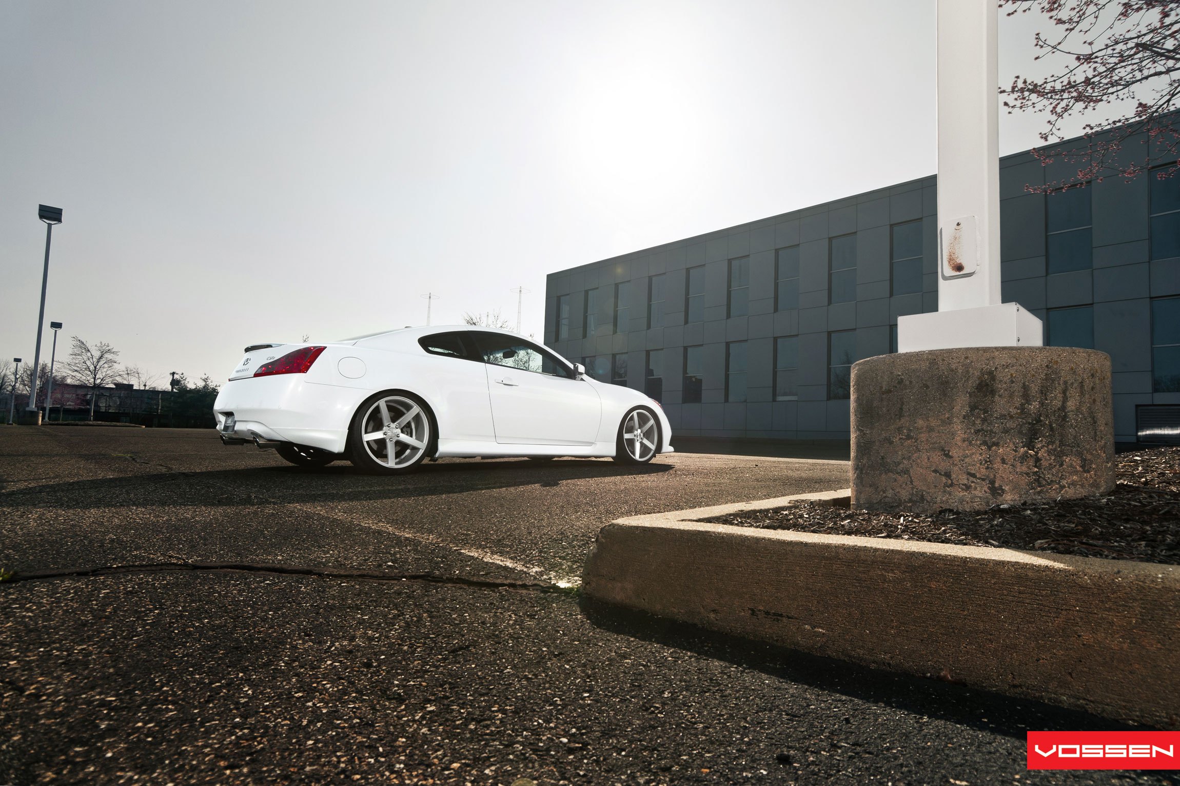 White Infiniti G37 with Factory Style Rear Spoiler - Photo by Vossen