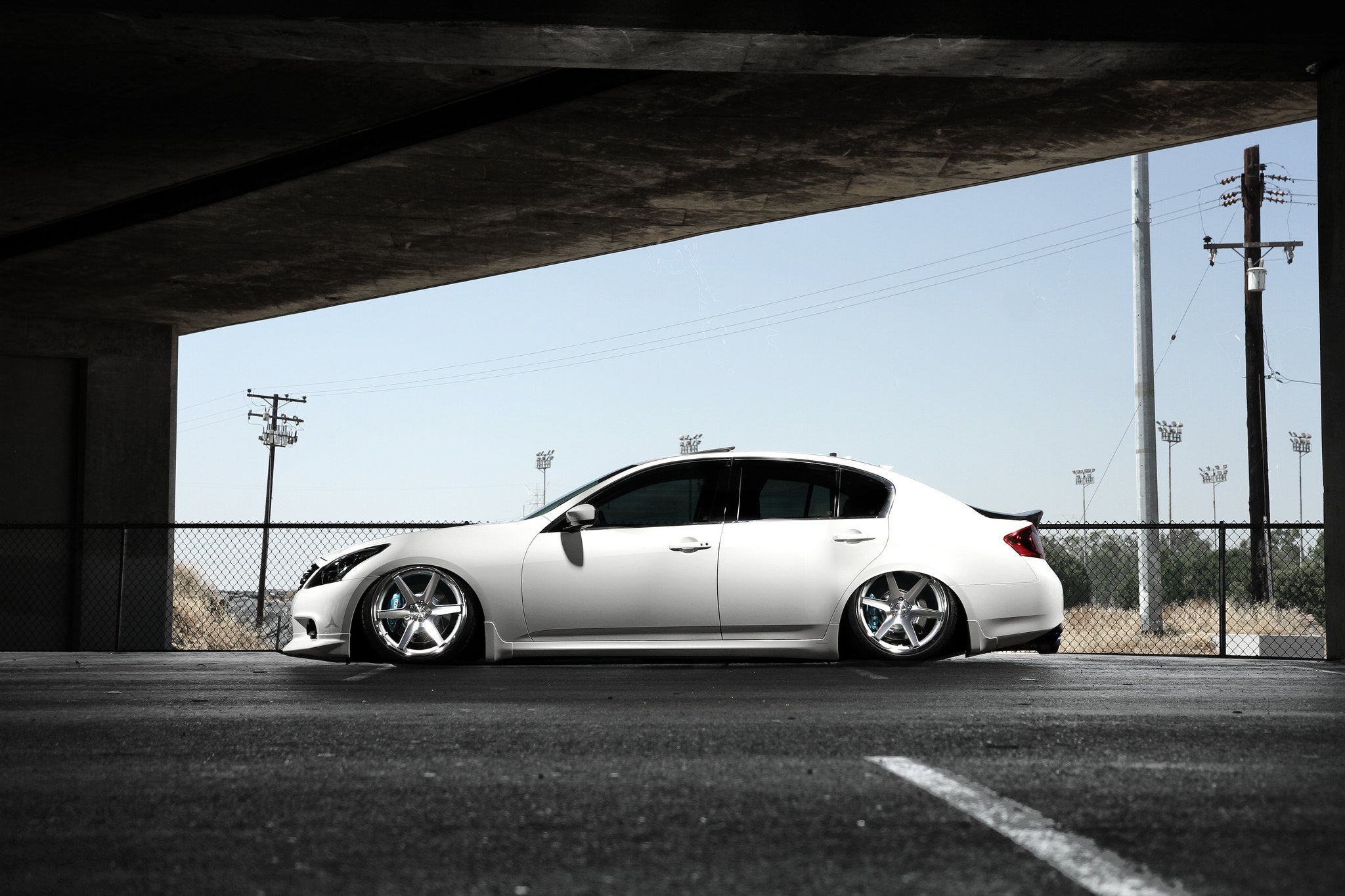 White Stanced Infiniti G37 Side Skirts - Photo by Concept One