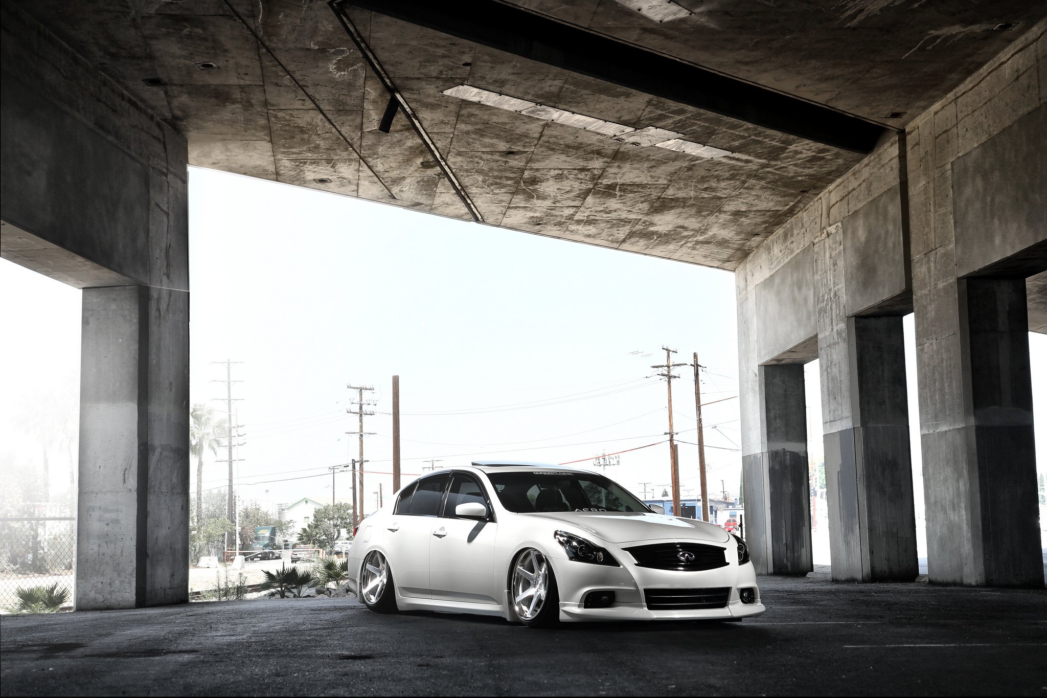 Custom Front Bumper on White Stanced Infiniti G37 - Photo by Concept One