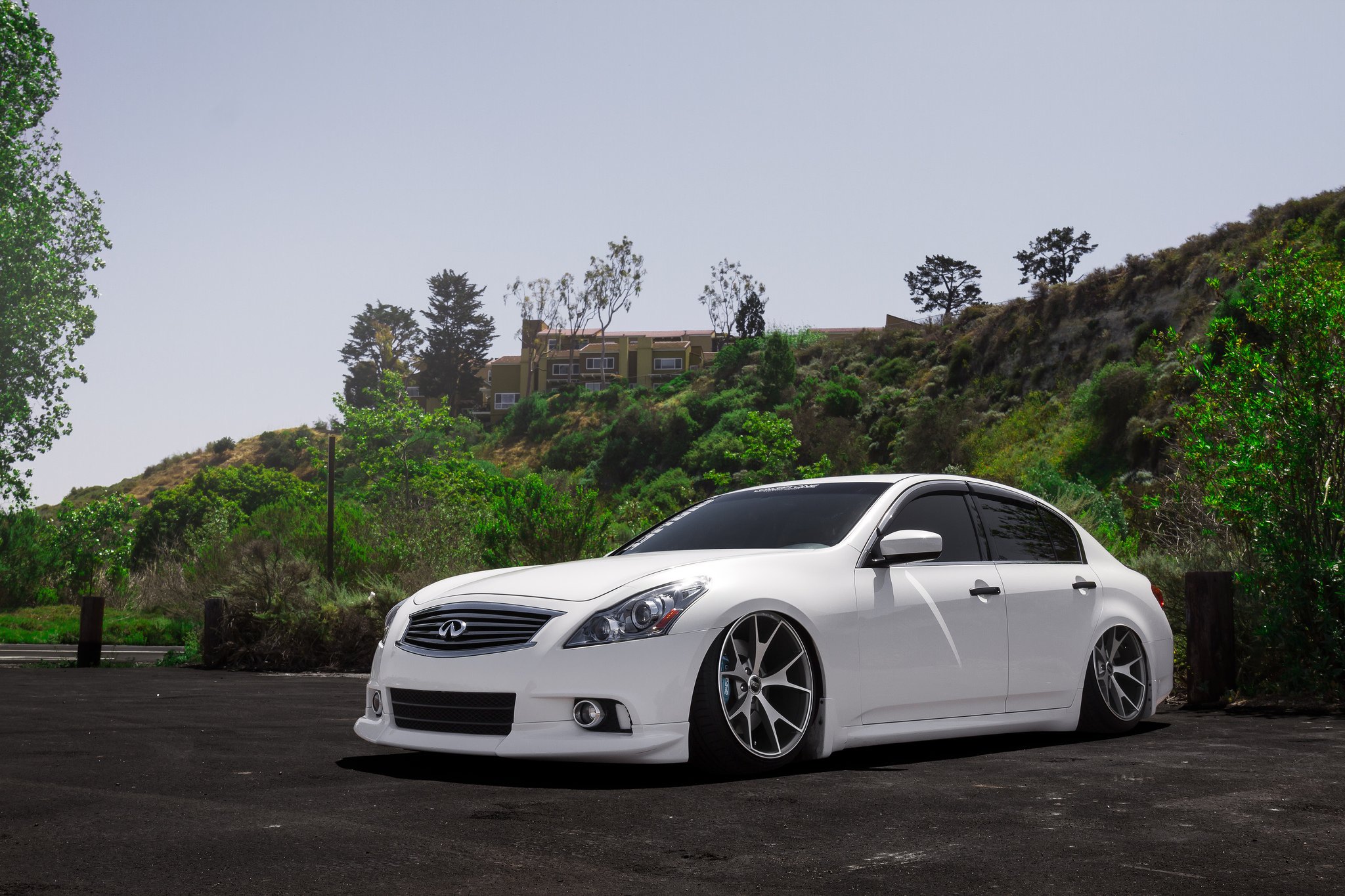 White Infiniti G37 with Chrome Billet Grille - Photo by Concept One