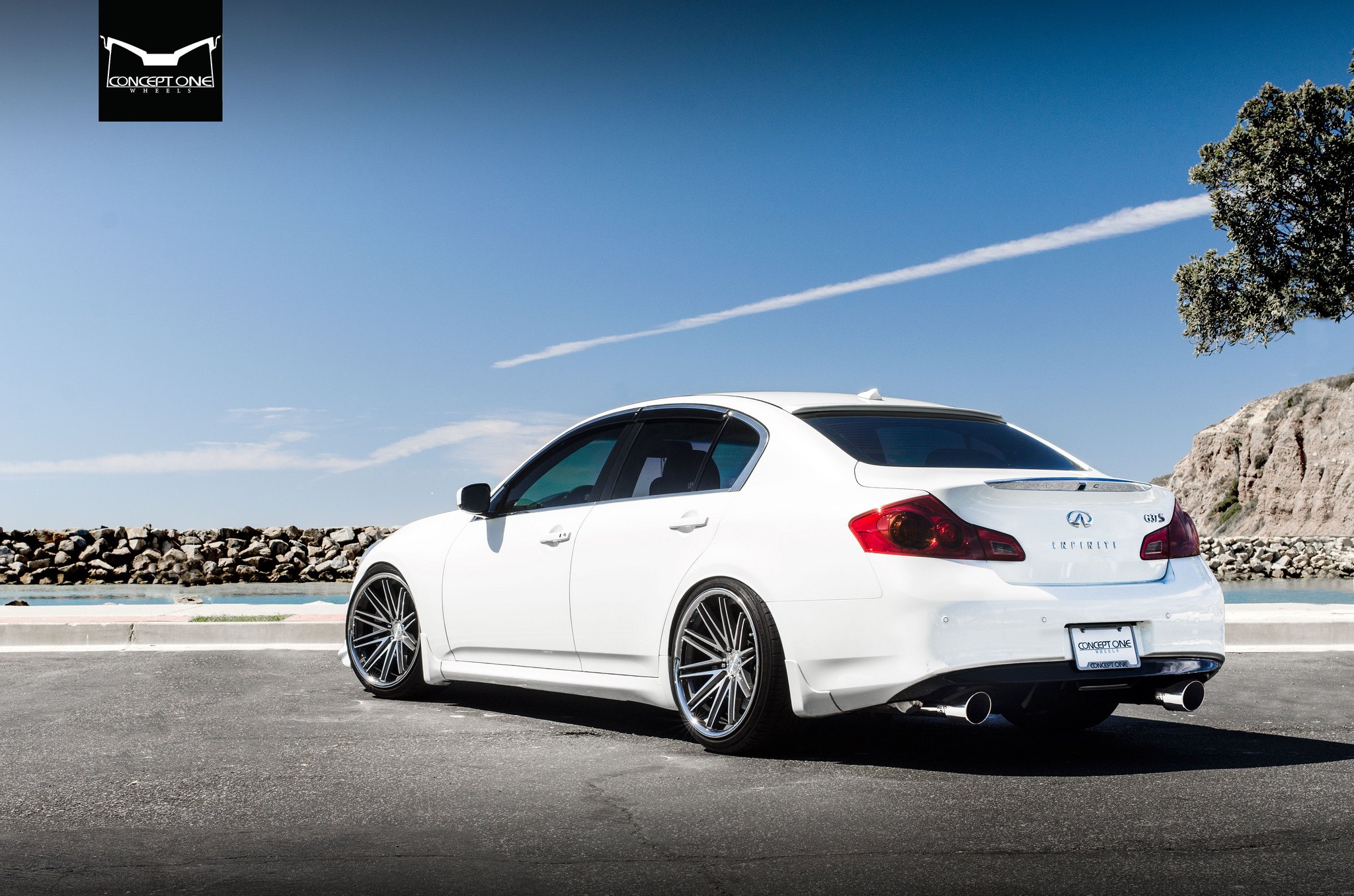 White Infiniti G37 with Chrome Rear Lip Spoiler - Photo by Concept One