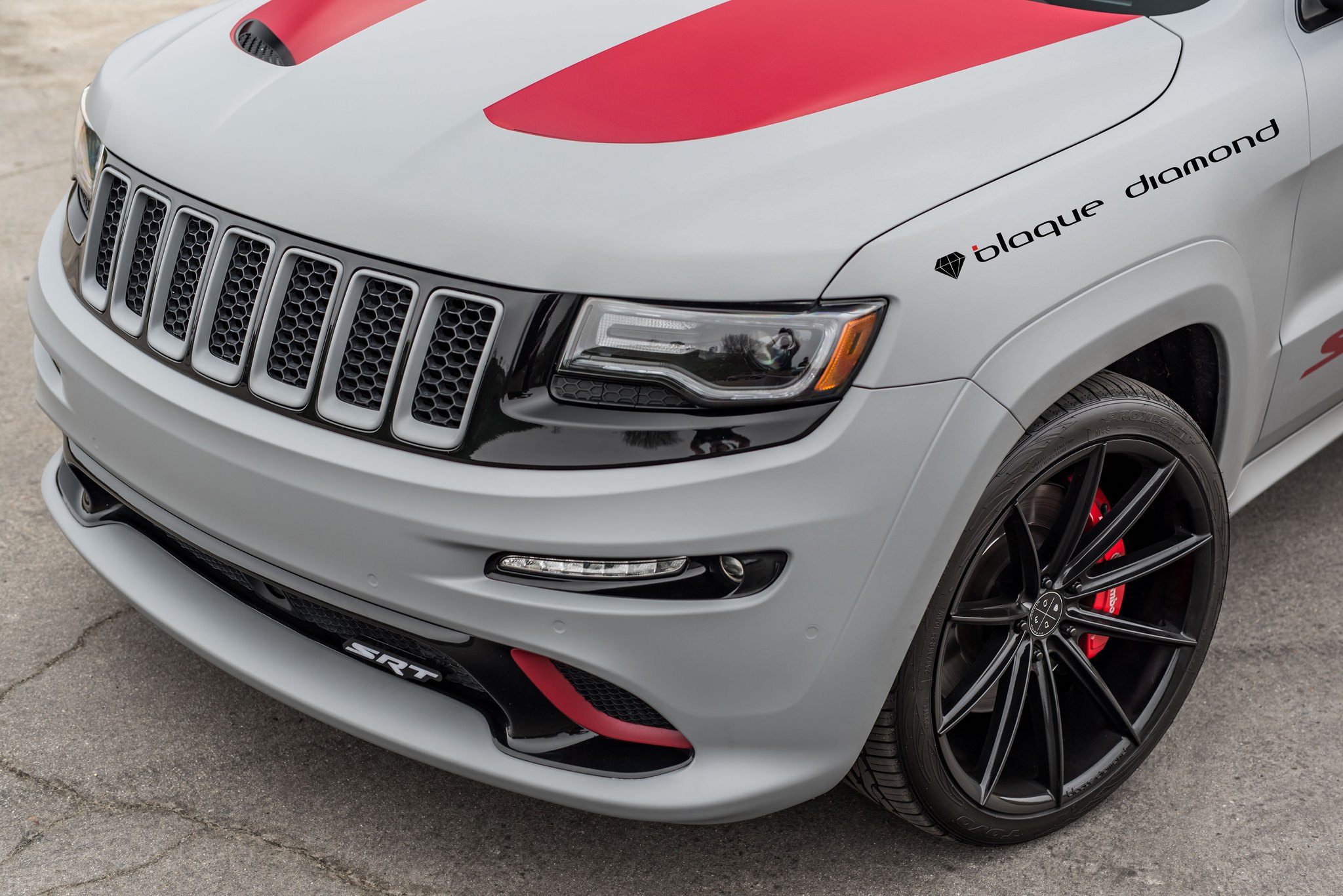 Jeep Grand Cherokee SRT with Aftermarket Headlights Sideview - Photo by Black Diamond