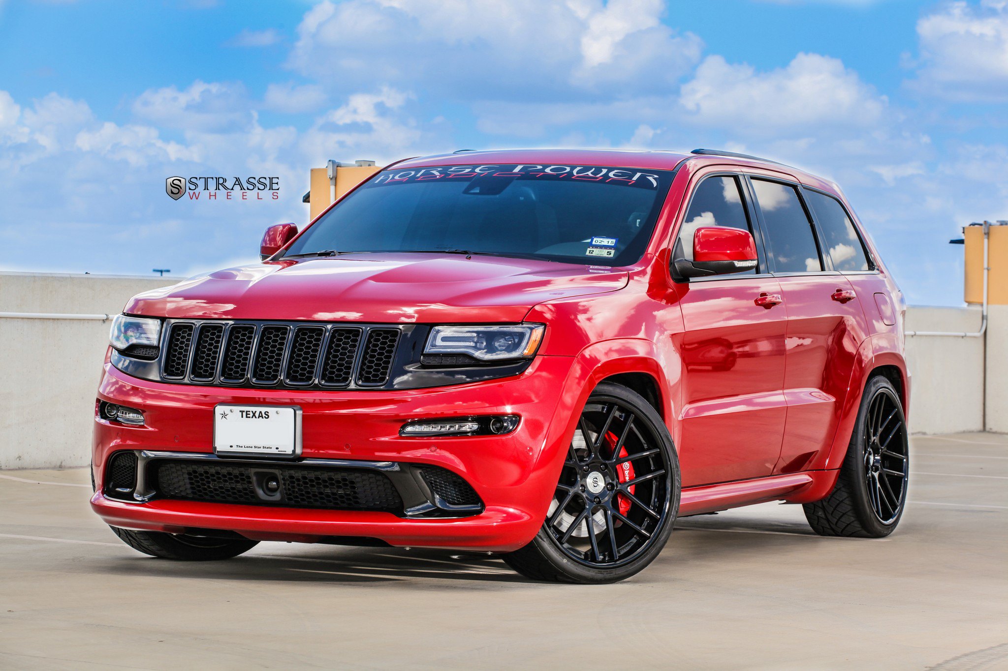 Red Jeep Grand Cherokee with Blacked Out Grille - Photo by Strasse Forged