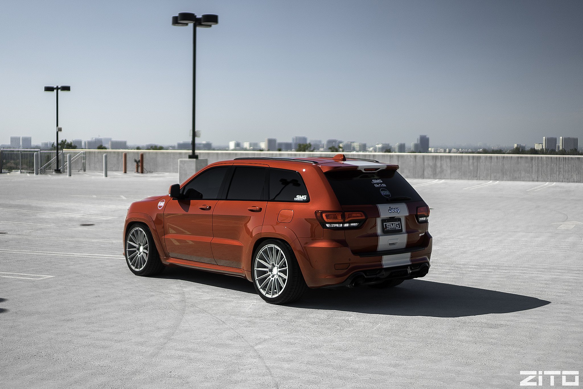 Roofline Spoiler with Light on Orange Jeep Grand Cherokee - Photo by Zito Wheels