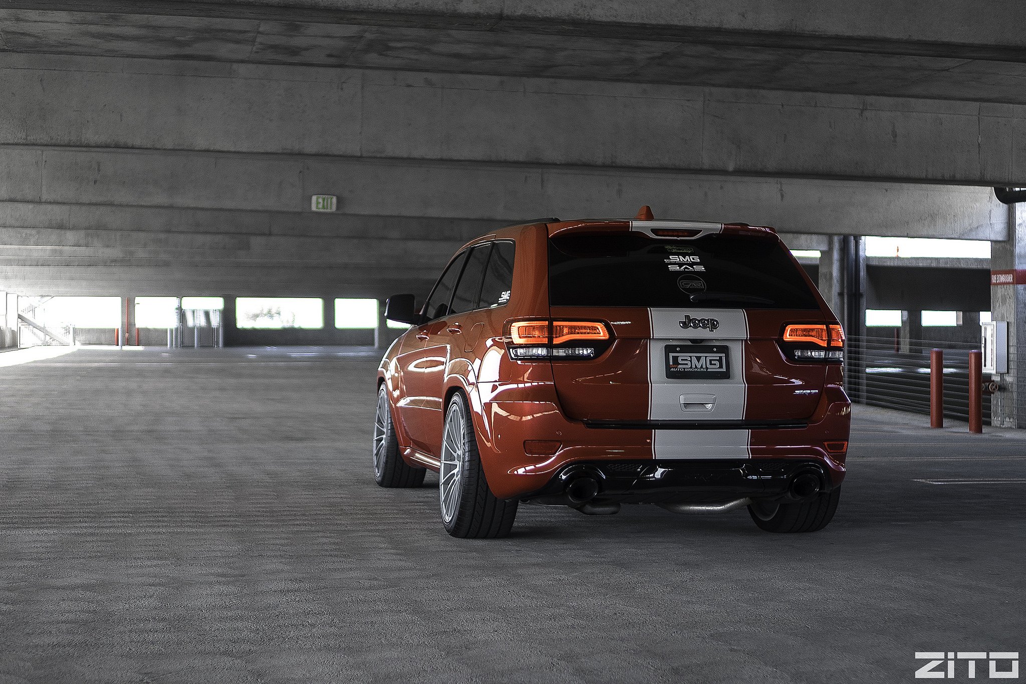 Aftermarket Rear Diffuser on Orange Jeep Grand Cherokee - Photo by Zito Wheels