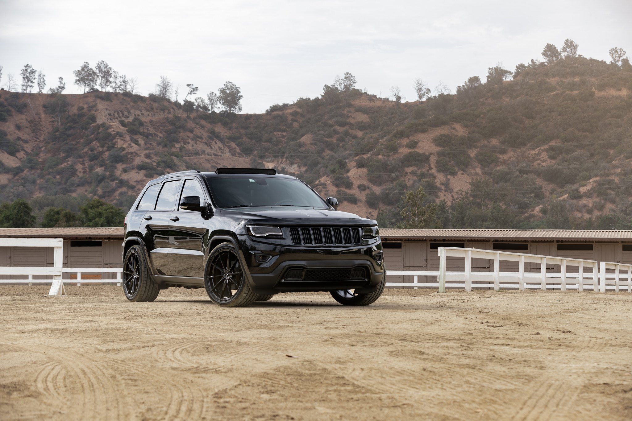 Black Jeep Grand Cherokee with Custom Front Bumper - Photo by Vorsteiner