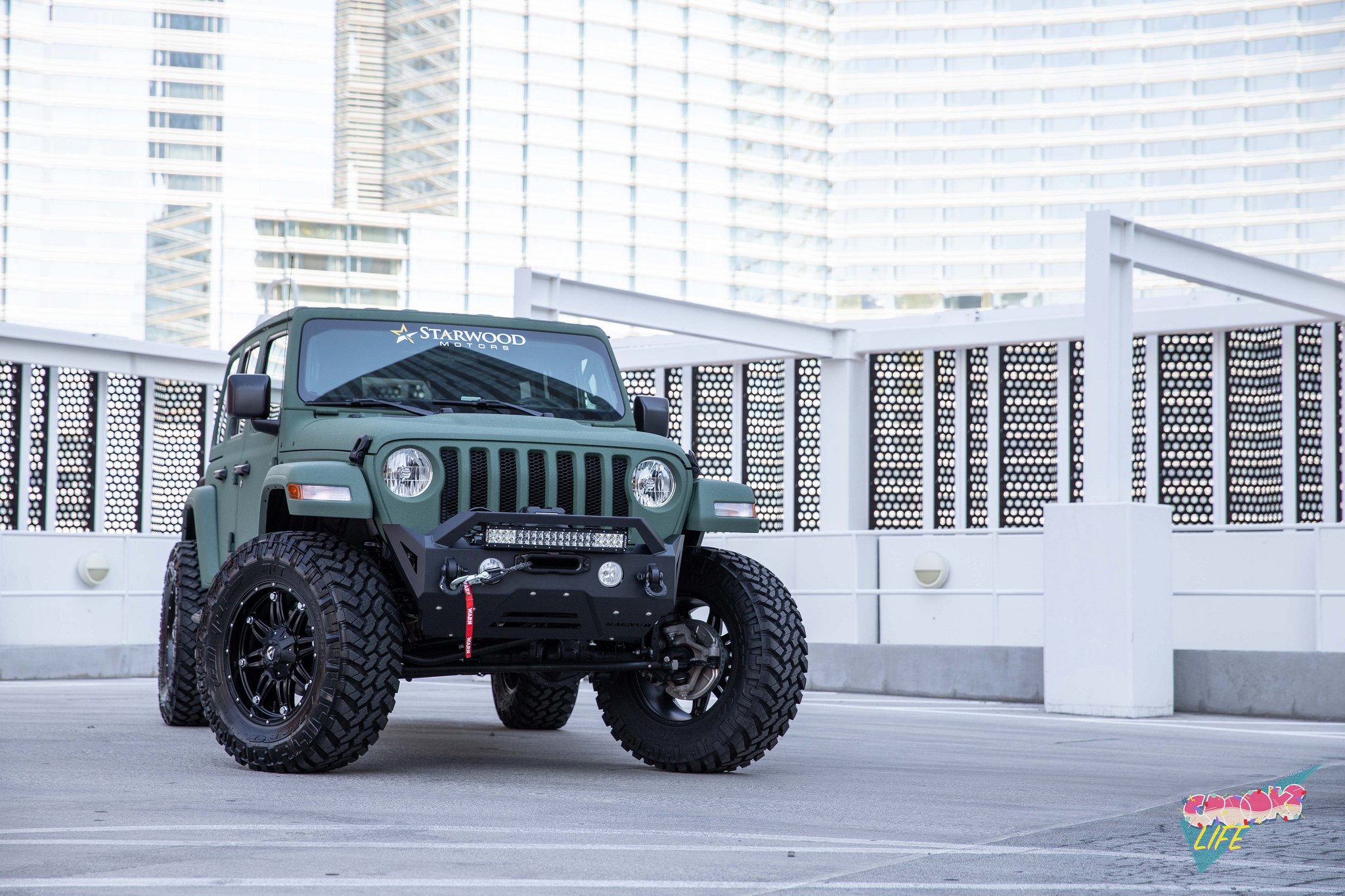 Off-Road Front Winch Bumper on Green Jeep Wrangler  - Photo by Jimmy Crook