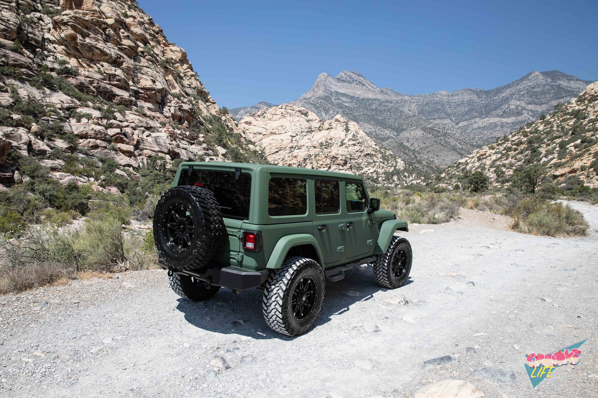 Green Jeep Wrangler with Spare Tire Kit - Photo by Jimmy Crook
