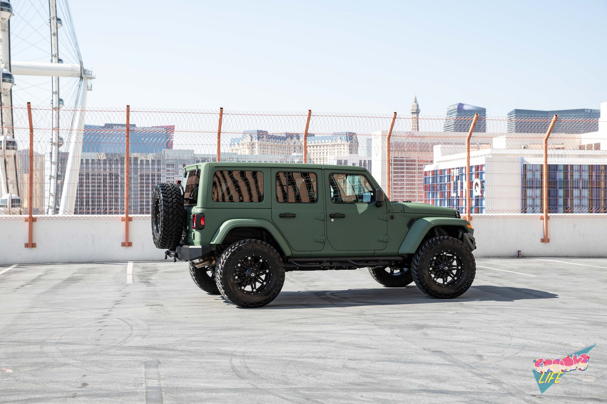 Green Jeep Wrangler with Fuel Off-Road Wheels - Photo by Jimmy Crook