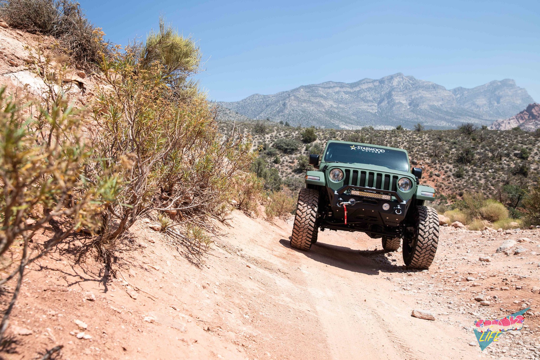 Green Jeep Wrangler with Off-road LED Light Bar - Photo by Jimmy Crook