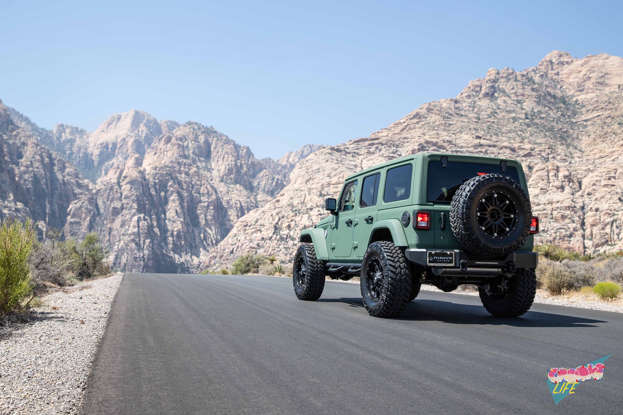 Off-Road Rear Bumper on Green Jeep Wrangler  - Photo by Jimmy Crook