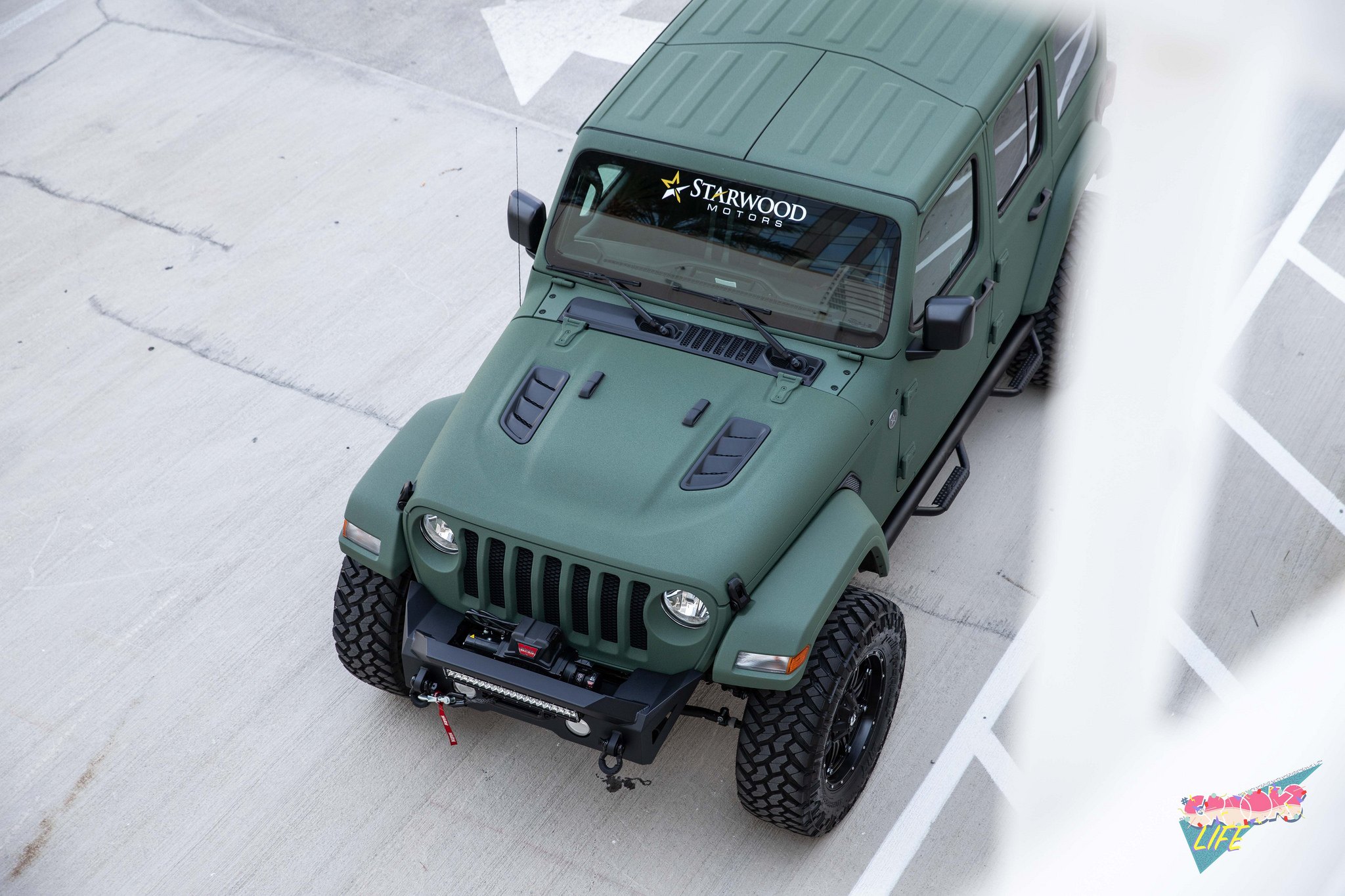 Green Jeep Wrangler with Custom Vented Hood - Photo by Jimmy Crook