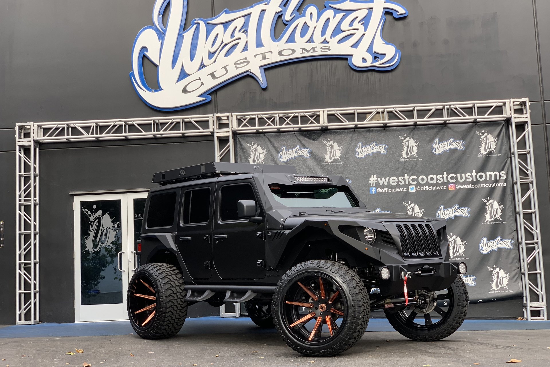 Black Lifted Jeep Wrangler with Off-Road Front Bumper - Photo by Forgiato
