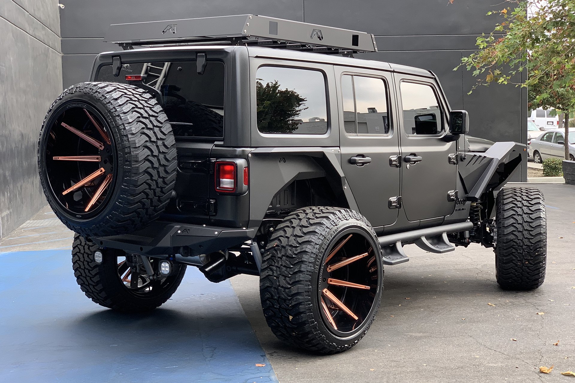 Fab Fours Rear Bumper on Black Lifted Jeep Wrangler - Photo by Forgiato