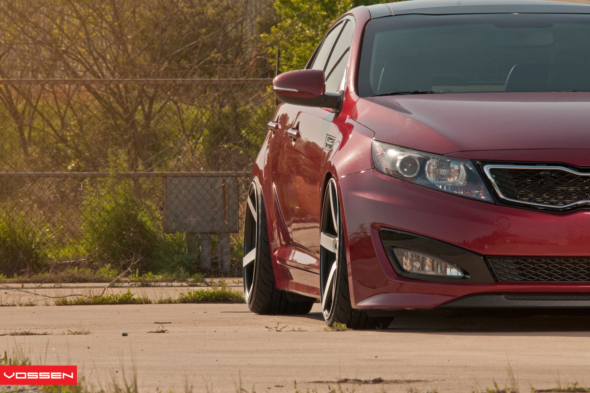 Red Kia Optima with Aftermarket Headlights - Photo by Vossen