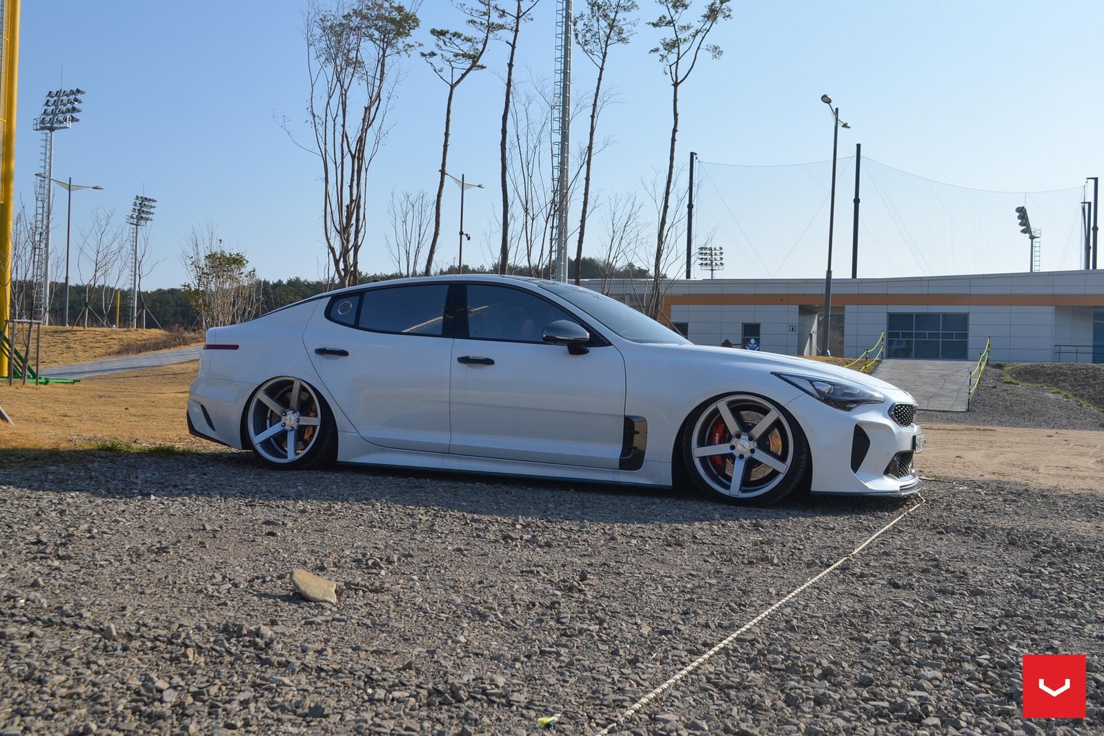 White Kia Stinger with Aftermarket Side Skirts - Photo by Vossen
