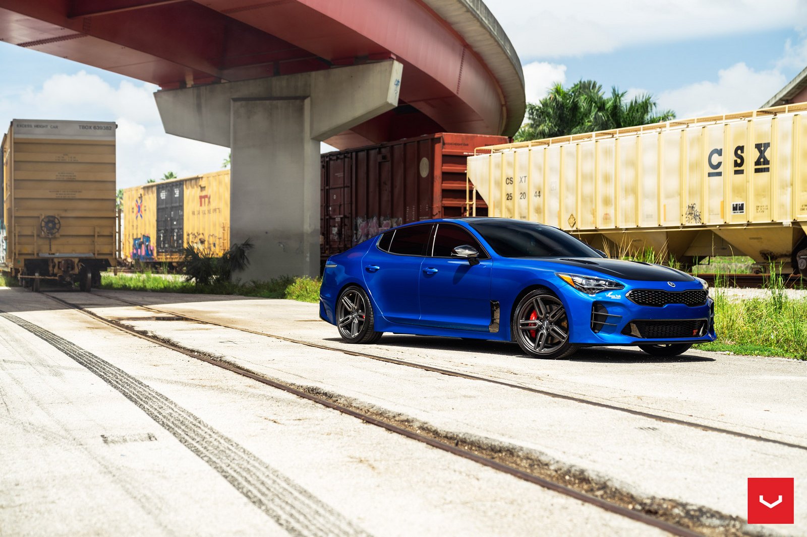 Blue Kia Stinger with Custom Projector Headlights - Photo by Vossen
