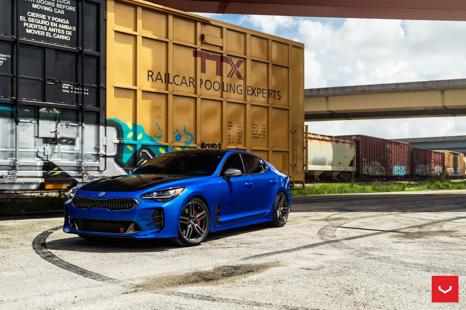 Blacked Out Mesh Grille on Blue Kia Stinger - Photo by Vossen