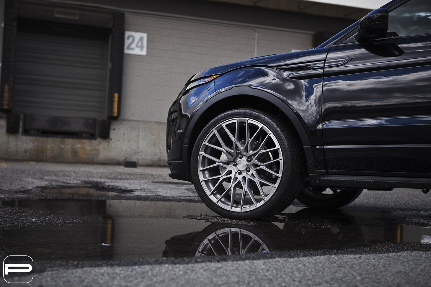 Pirelli Tires on Custom Black Range Rover Evoque - Photo by PUR Wheels