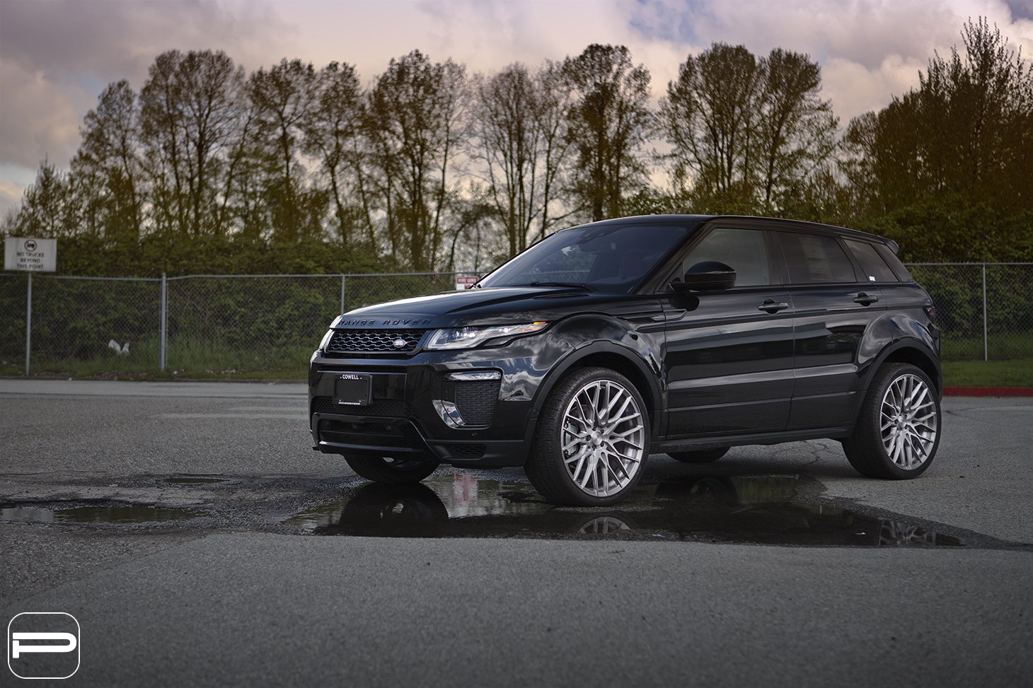 Black Range Rover Evoque with Aftermarket Headlights - Photo by PUR Wheels
