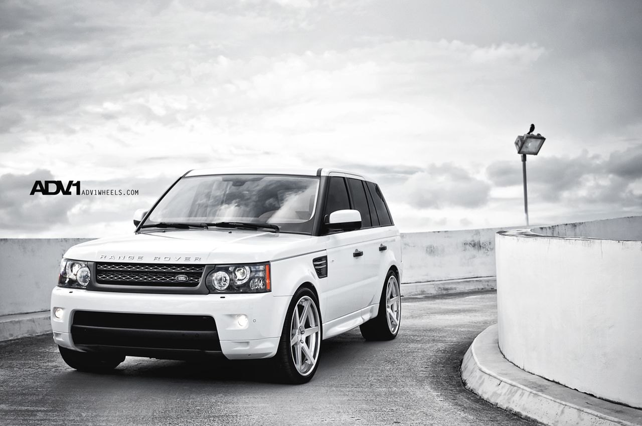 Aftermarket Headlights on White Range Rover Sport - Photo by ADV.1
