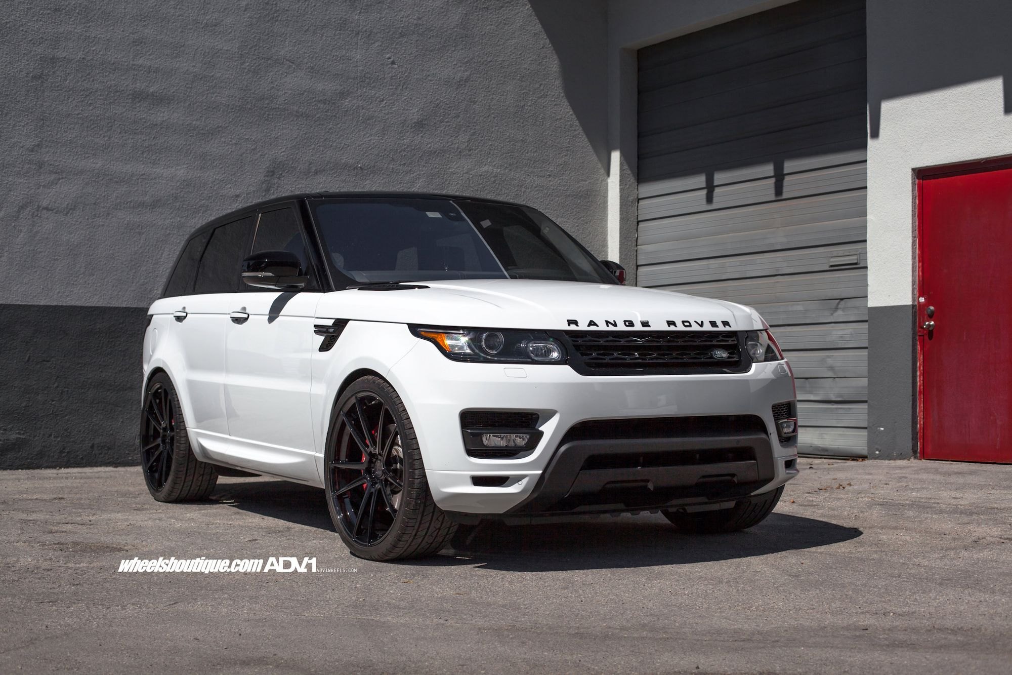 White Range Rover Sport with Textured Black Bumper Guard - Photo by ADV.1
