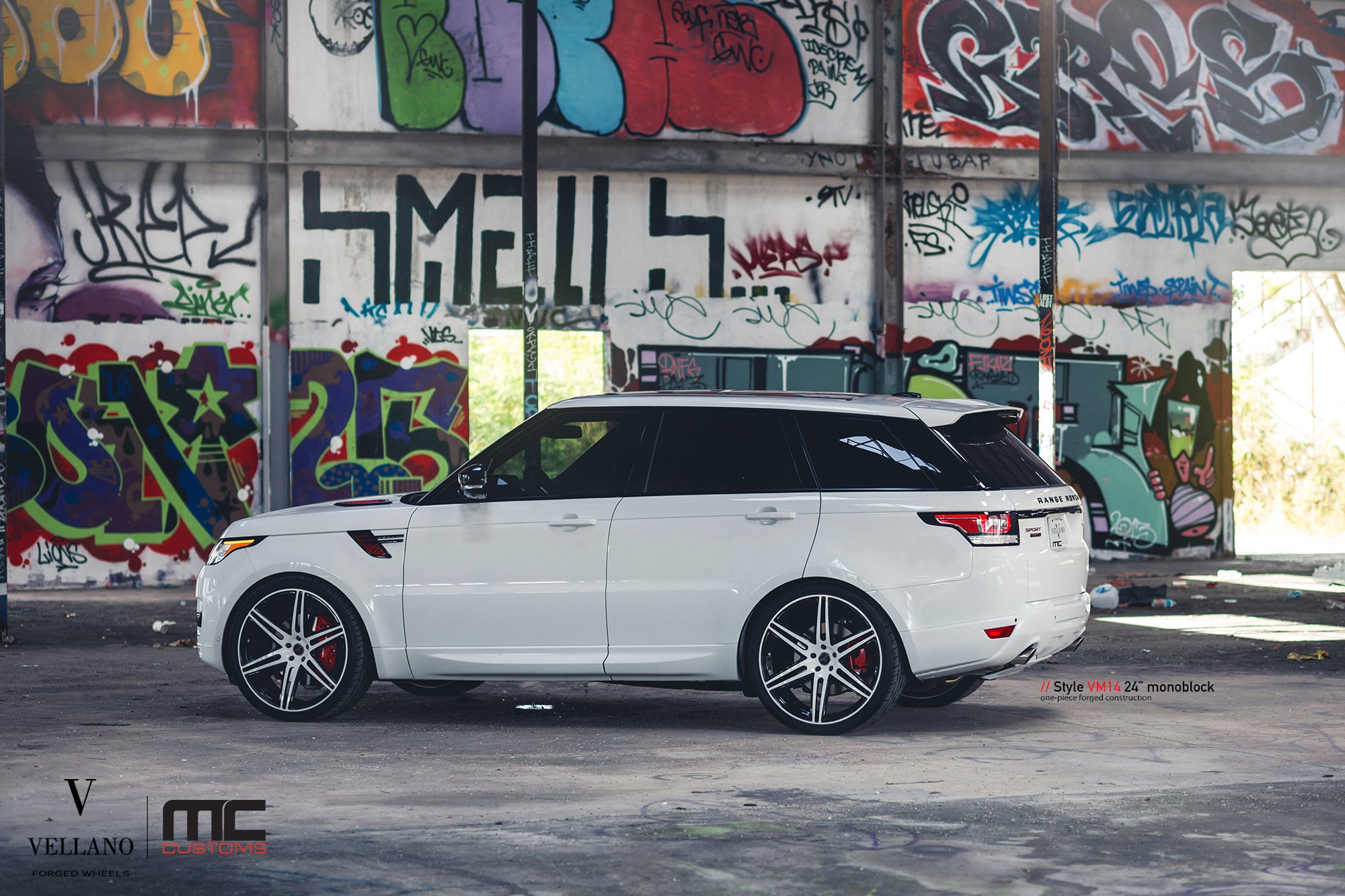 White Range Rover Sport with Aftermarket Roofline Spoiler - Photo by Vellano
