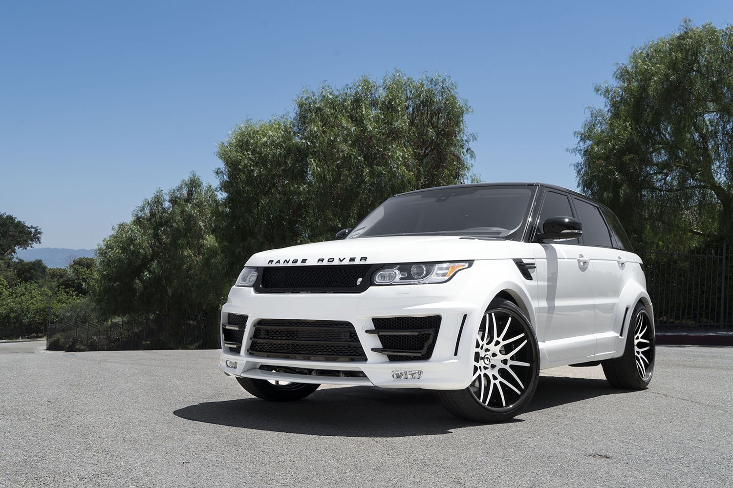 White Range Rover Sport with Custom Front Bumper - Photo by Forgiato