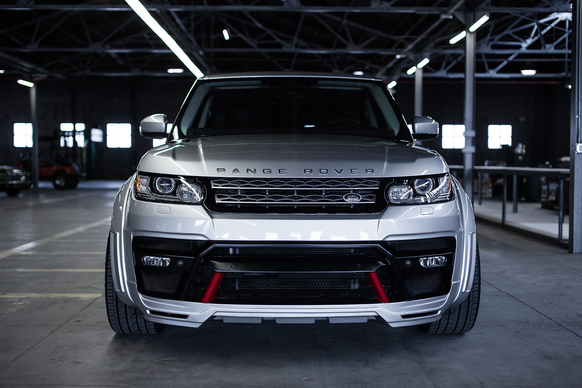 Gray Range Rover Sport with Aftermarket Headlights - Photo by Forgiato