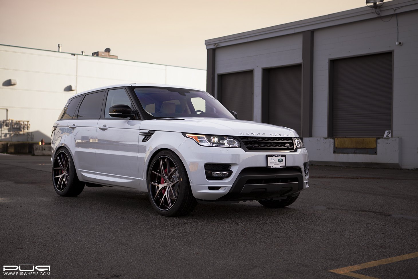 White Range Rover Sport with Aftermarket Bumper Guard - Photo by PUR Wheels