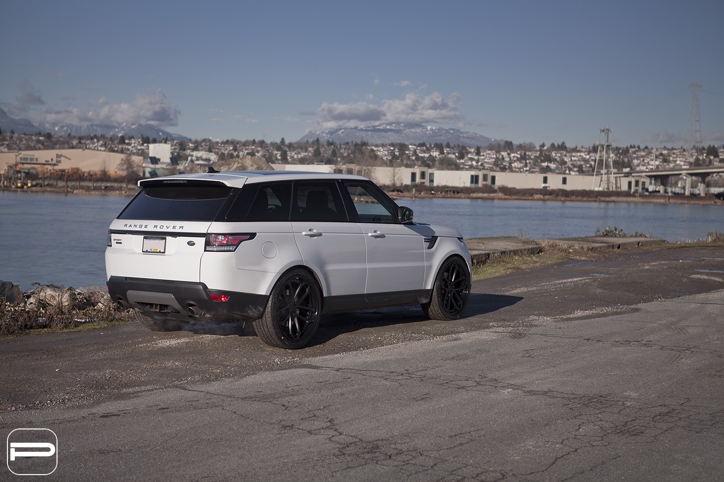 White Range Rover Sport with Large Roofline Spoiler - Photo by PUR Wheels