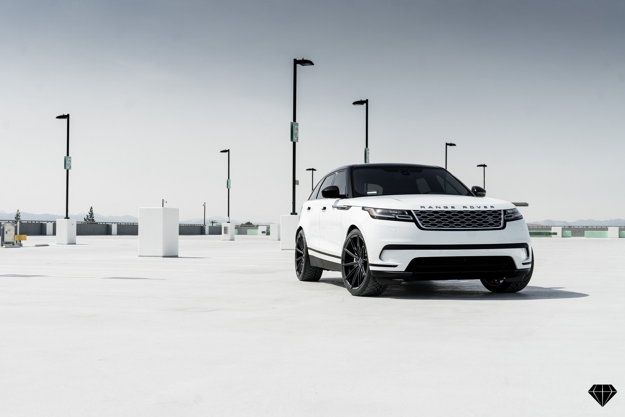 White Range Rover Velar with Aftermarket Front Bumper - Photo by Blaque Diamond Wheels