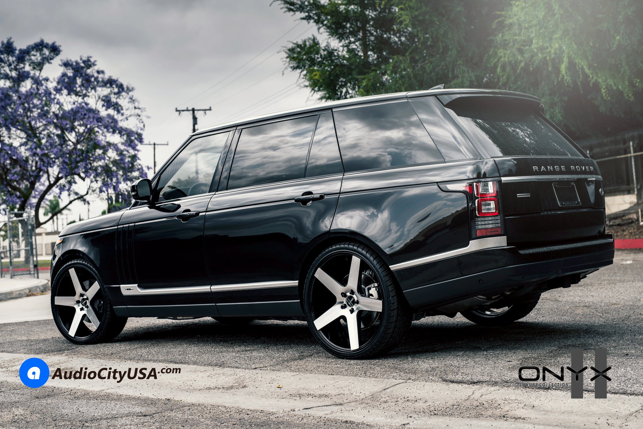 Custom Bodyside Moldings on Black Range Rover - Photo by Rennen International